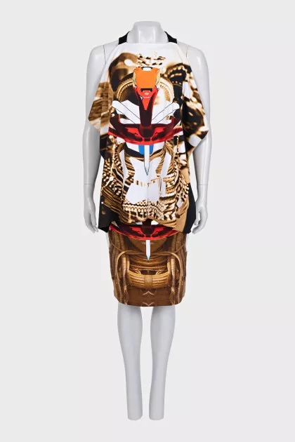A suit consisting of a fitted skirt and a printed top