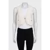 Cashmere vest with signature buttons