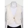 Cashmere vest with signature buttons