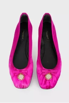 Ballet flats with bow and metal pendant