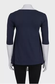 T-shirt decorated with a fringed patch