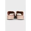 Beige leather flip-flops with high soles