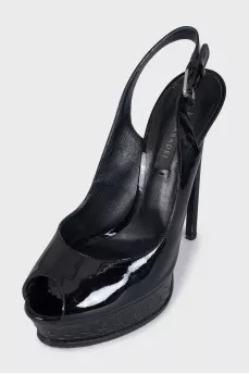 Patent leather sandals made of black leather