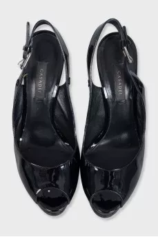 Patent leather sandals made of black leather