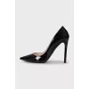 Black patent leather pumps
