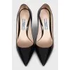 Black patent leather pumps