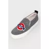 Textile slip-ons with stripes