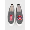 Textile slip-ons with stripes