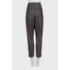 Shiny brown trousers