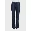 Blue jeans with embroidered logo