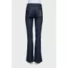 Blue jeans with embroidered logo