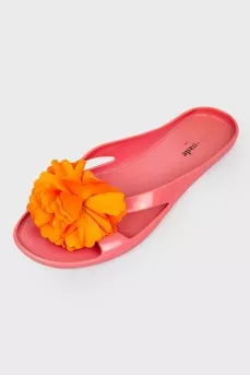 Flip flops cast with a fabric flower