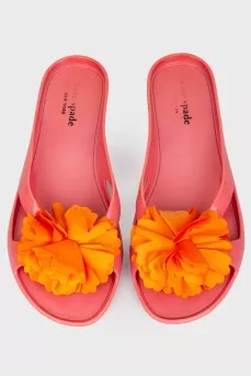 Flip flops cast with a fabric flower