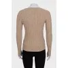 Brown jumper with a zip on the shoulder