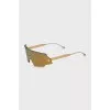 Gold sunglasses with gradient lenses