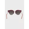Red sunglasses decorated with crystals
