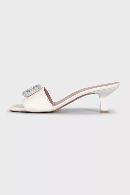 Leather mules with heels and embellishments