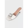 Leather mules with heels and embellishments