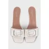 Leather mules with heels and embellishments