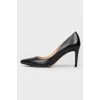 Shoes with a sharp toe on a stiletto