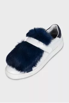 Leather sneakers decorated with blue fur