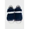 Leather sneakers decorated with blue fur