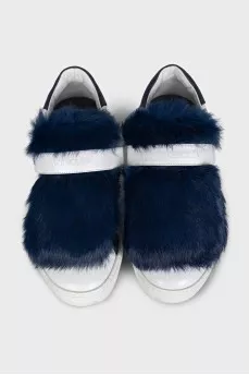 Leather sneakers decorated with blue fur