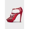 Red embossed leather sandals
