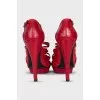 Red embossed leather sandals