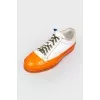 White-orange sneakers with laces