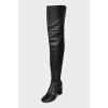 Leather over-the-knee boots with a zipper