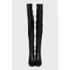 Leather over-the-knee boots with a zipper