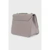 Leather crossbody bag with chain