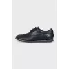 Men's leather shoes with perforations and laces