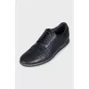 Men's leather shoes with perforations and laces