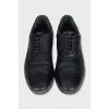 Men's leather shoes with perforations and laces