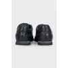 Men's leather shoes with perforations and laces