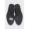 Men's leather shoes with perforations and laces