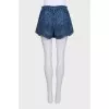 Shorts with a belt decorated with embroidery