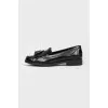 Black loafers at low speed with brushes