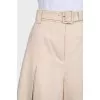Beige wide-leg trousers with tag
