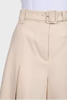 Beige wide-leg trousers with tag