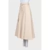 Beige wide-leg trousers with tag