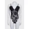 Black lace bodysuit with tag