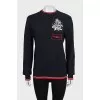 Black sweatshirt with a patch