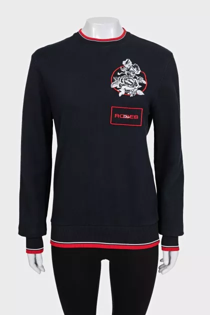 Black sweatshirt with a patch