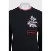 Black sweatshirt with a patch