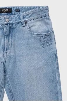 Men's light blue jeans with a patch