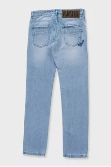 Men's light blue jeans with a patch