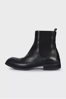 Black boots with rubber inserts